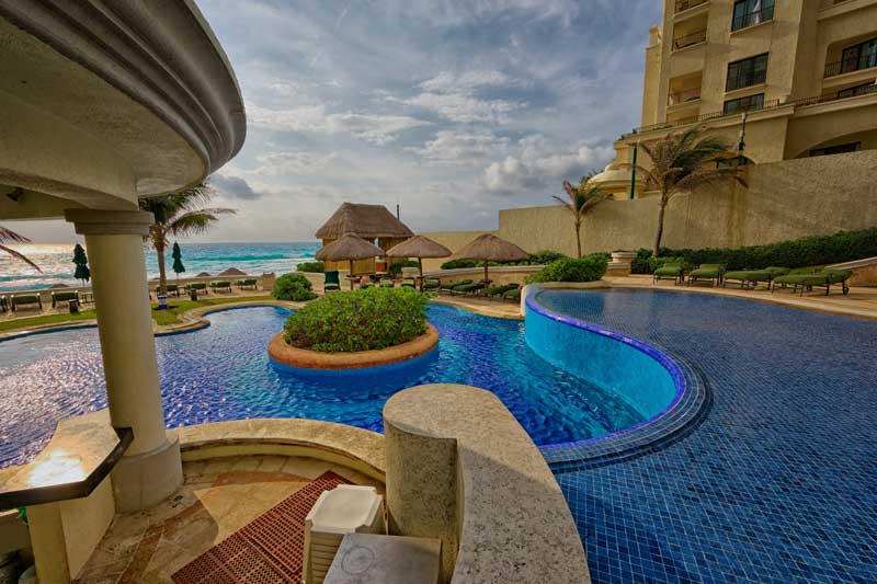 Resort Homes Group featured image pool near beach